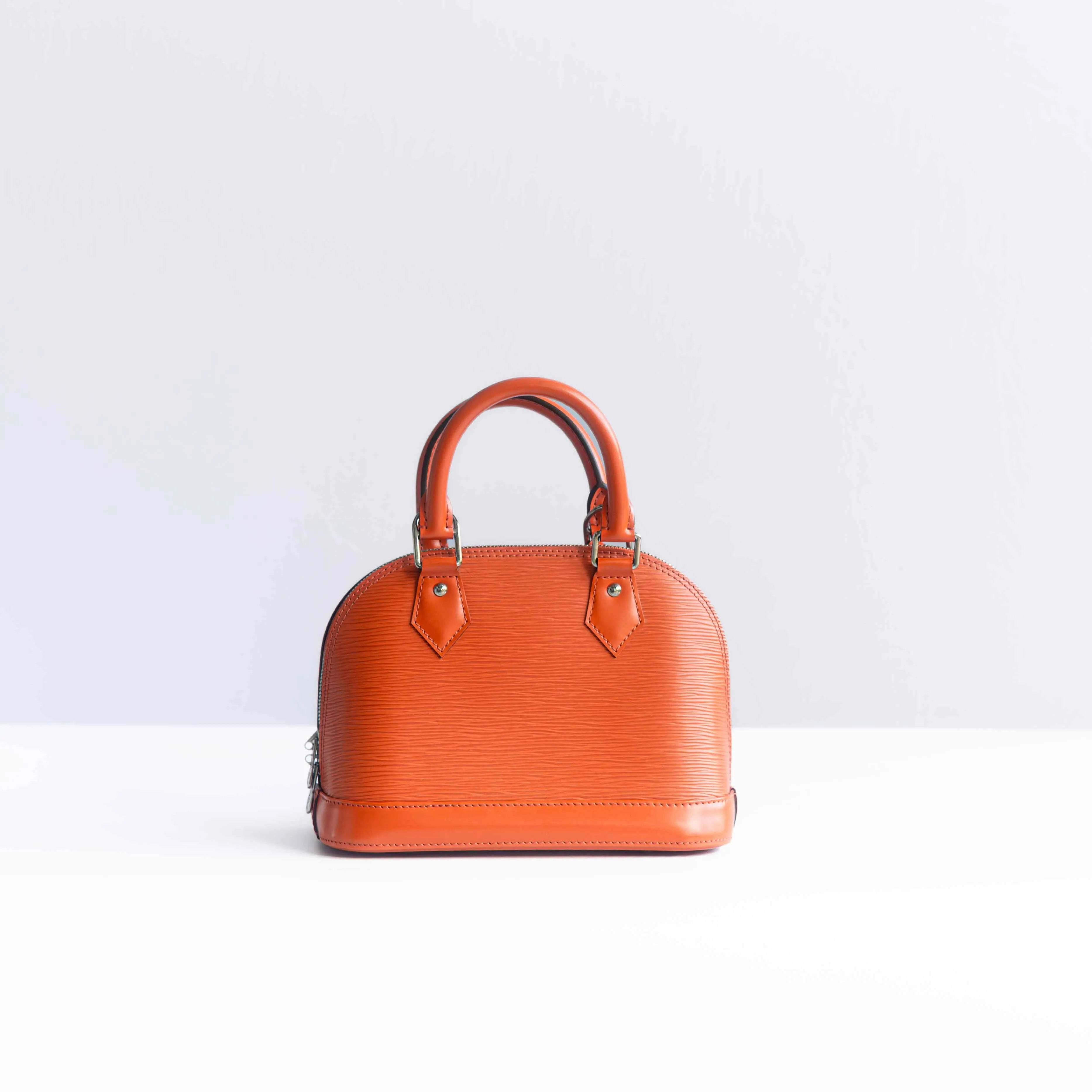 LOUIS VUITTON - BAG ALMA BB ORANGE LEATHER WITH STRAP